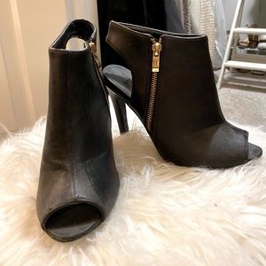 Black Heels with gold zipper